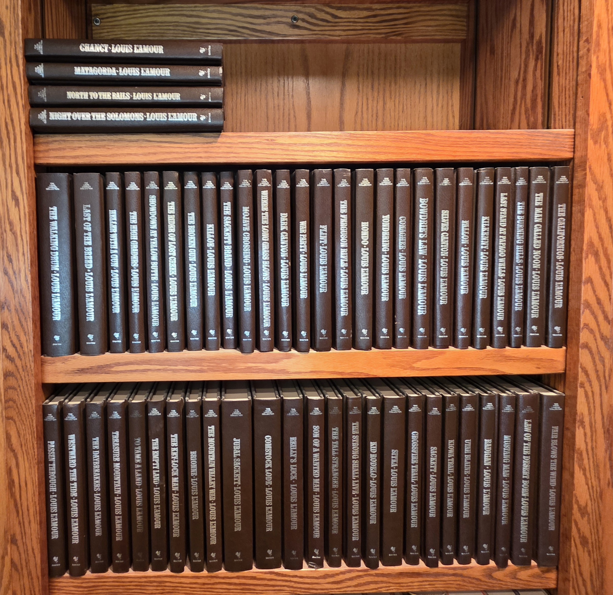 Louis L’Amour Collection Brown Hardcovers ~55 | Maxsold