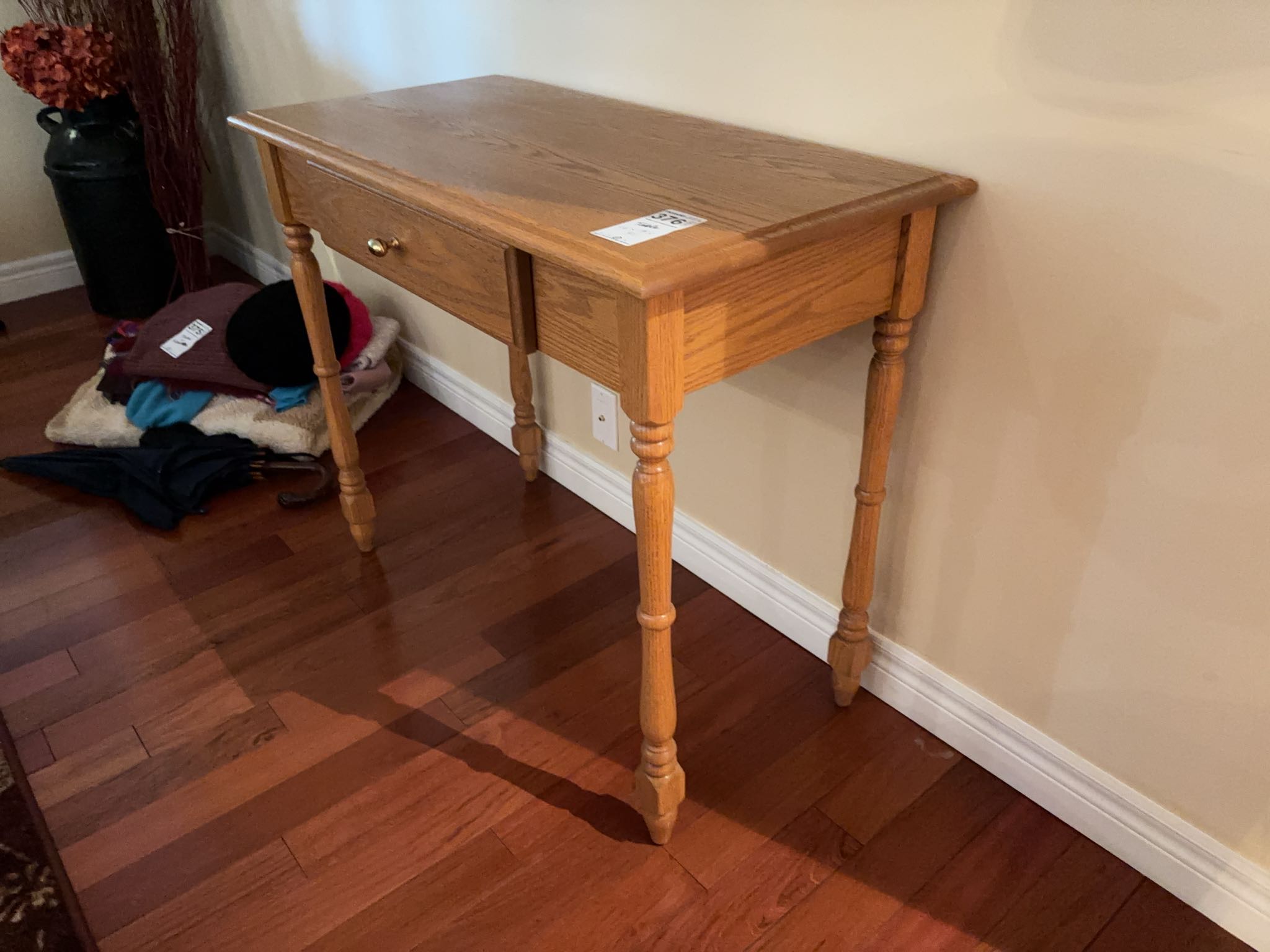 Oak veneer console table with drawer | Maxsold