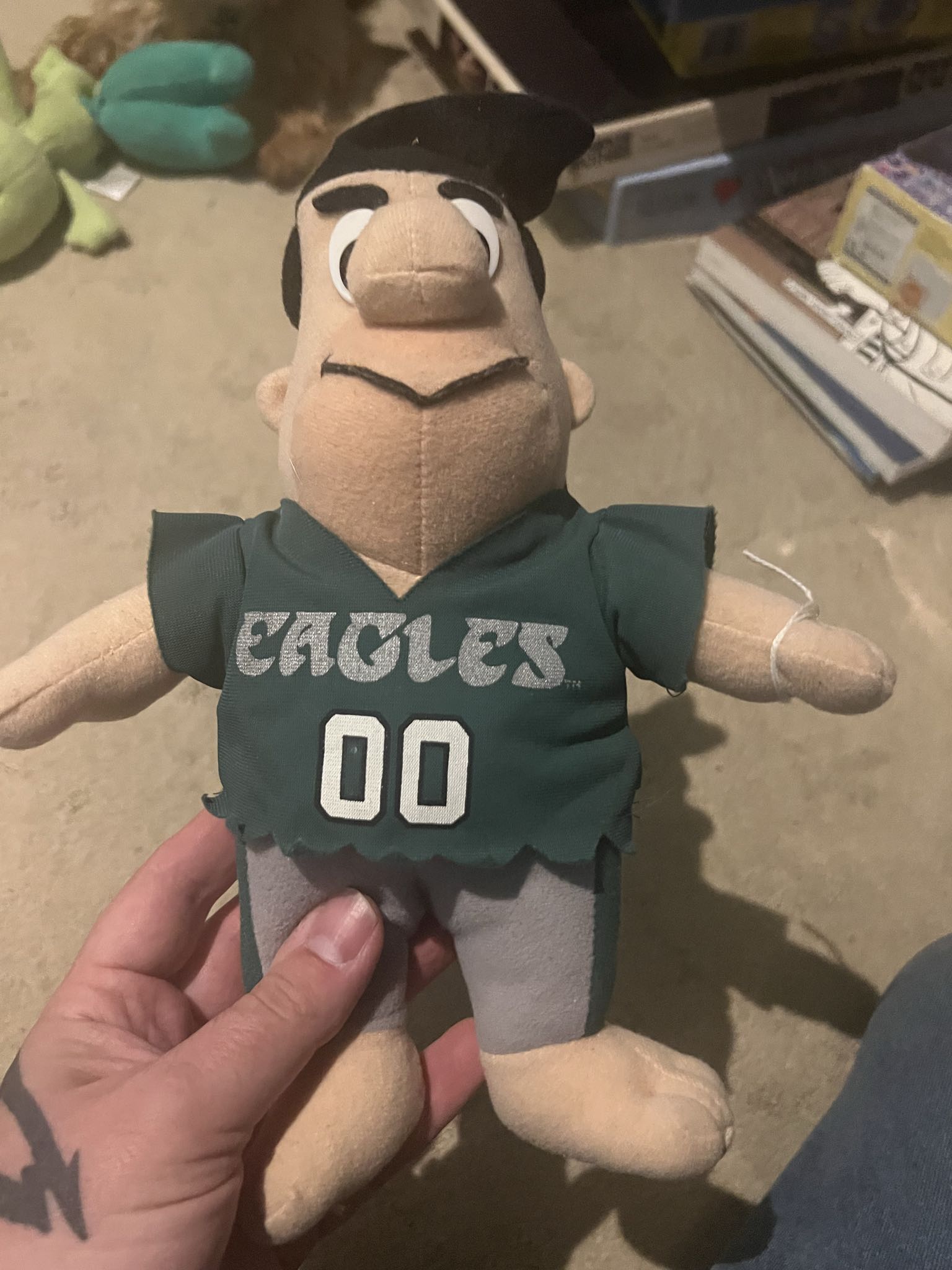 1994 Fred Flintstone Philadelphia Eagles plush doll | Maxsold