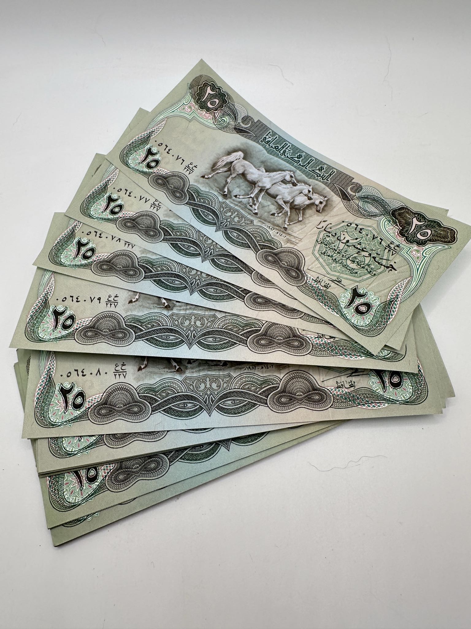 50 Uncirculated Iraqi 25 Dinar Banknotes | Maxsold
