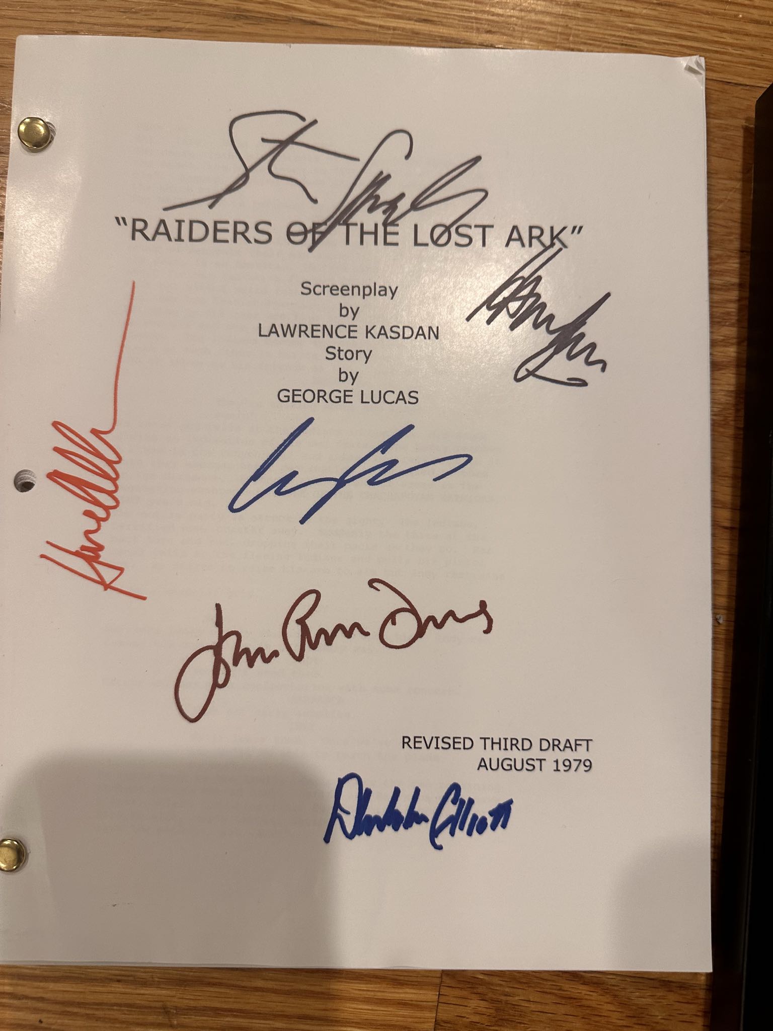 Signed 1979 Raiders of the Lost Ark script & Spielberg photo | Maxsold