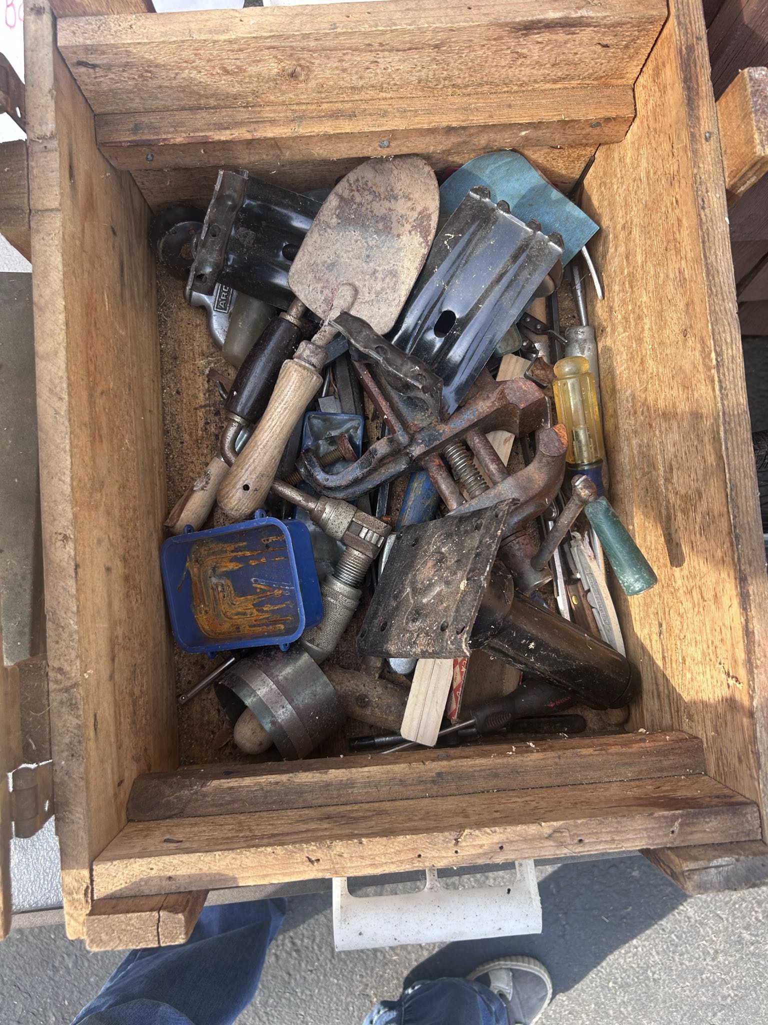 Wooden tool box with assorted vintage hand tools and hardware | Maxsold
