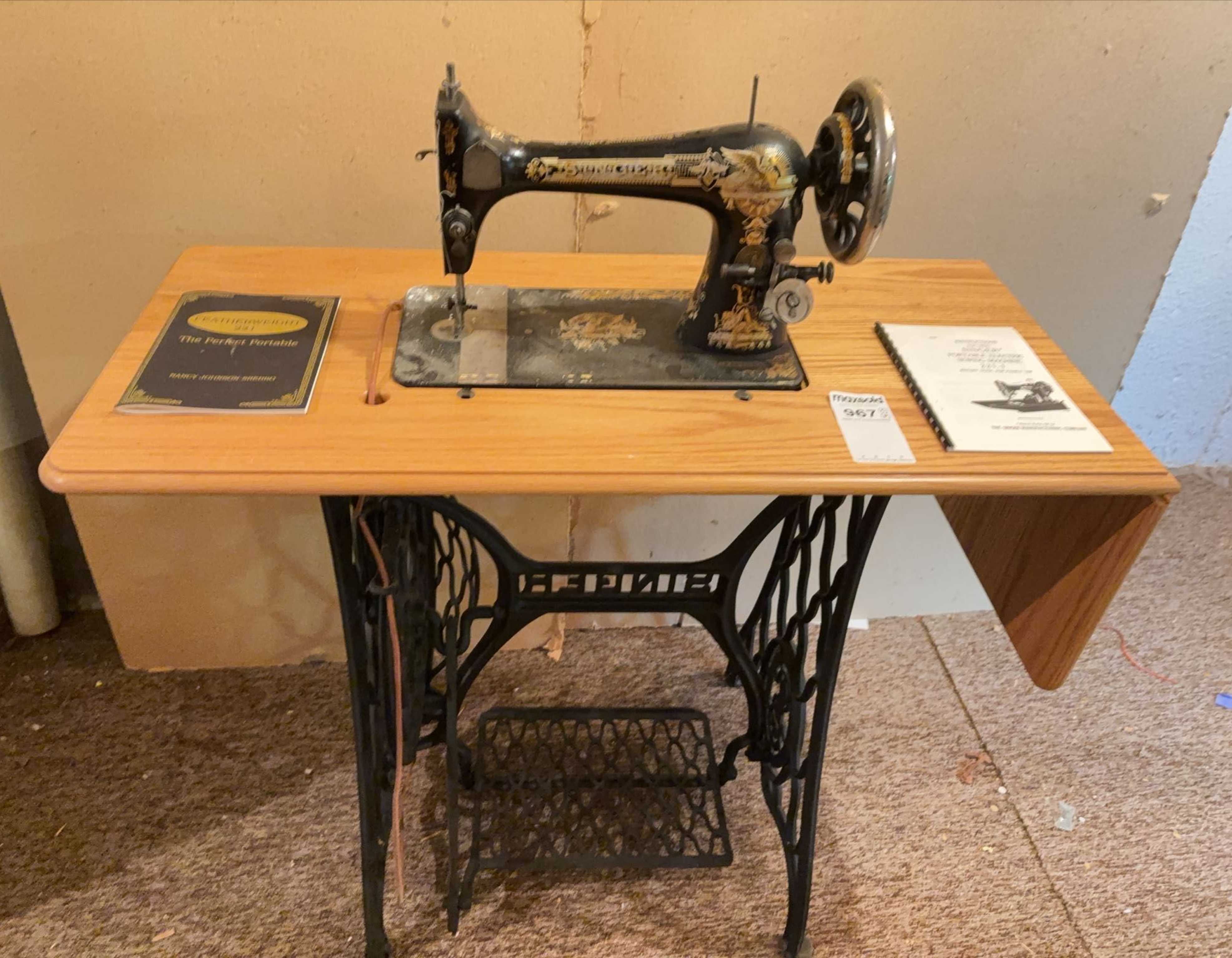 Singer treadle sewing machine on cast iron base | Maxsold