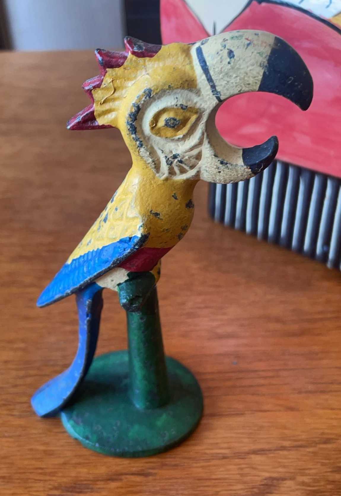 Ceramic Face Vase, Frog Figurine, Parrot Carving & Novelty Clock | Maxsold