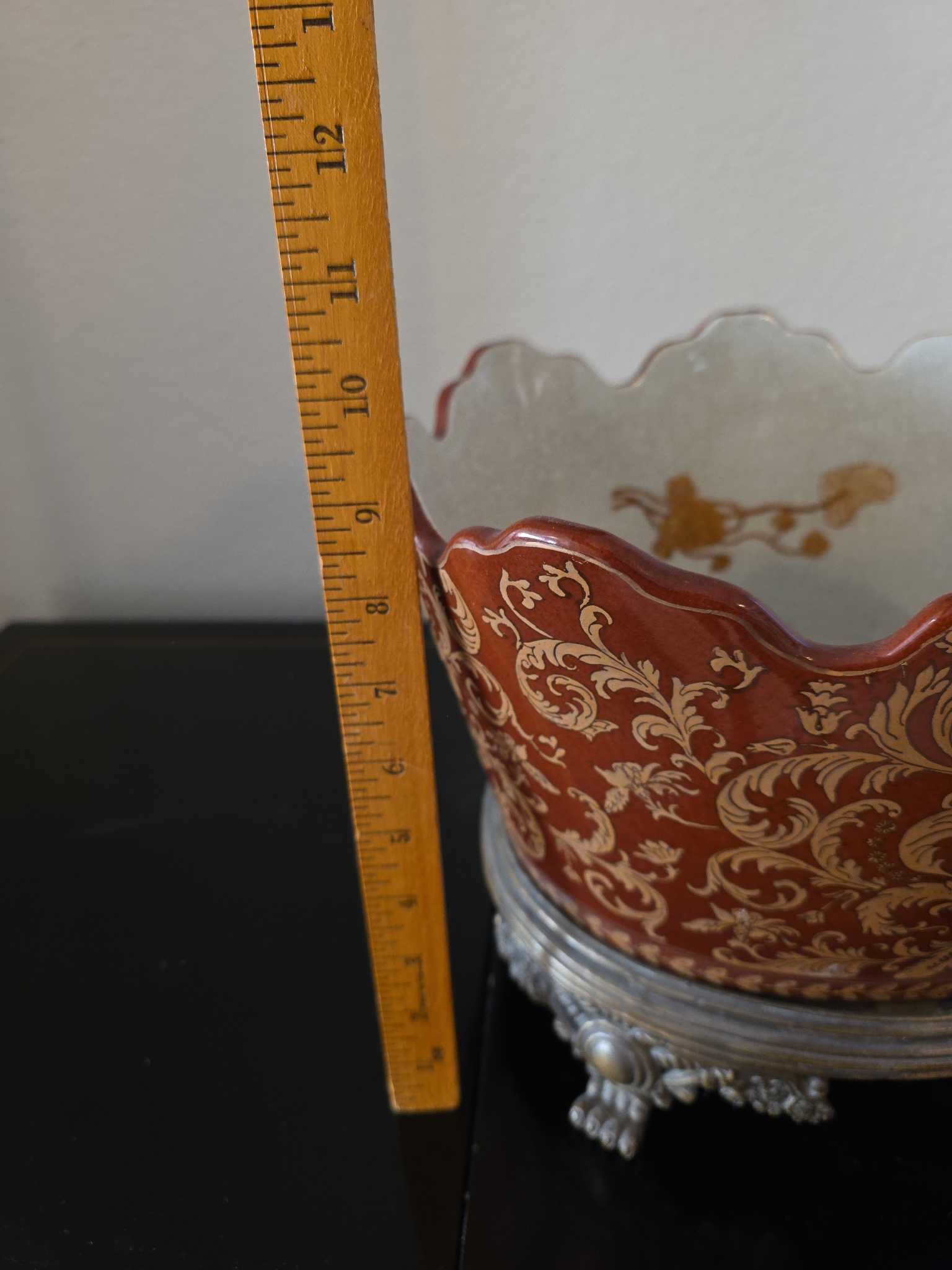 Burgundy floral scalloped porcelain planter with metal base | Maxsold