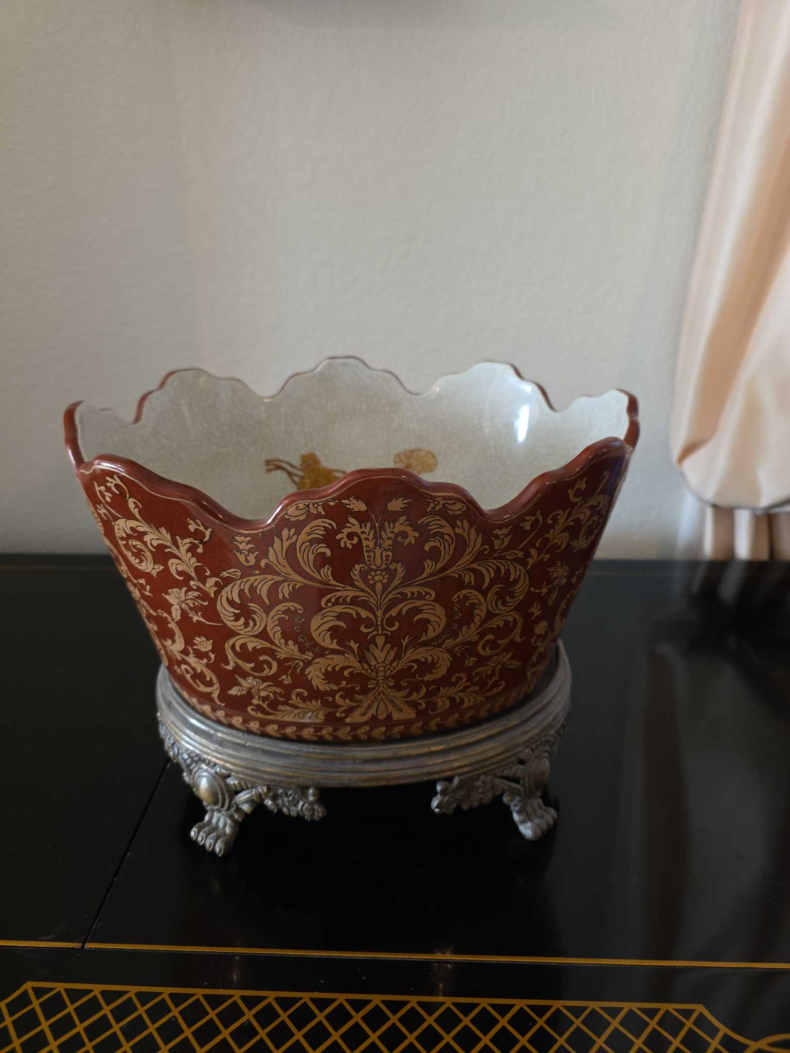 Burgundy floral scalloped porcelain planter with metal base | Maxsold