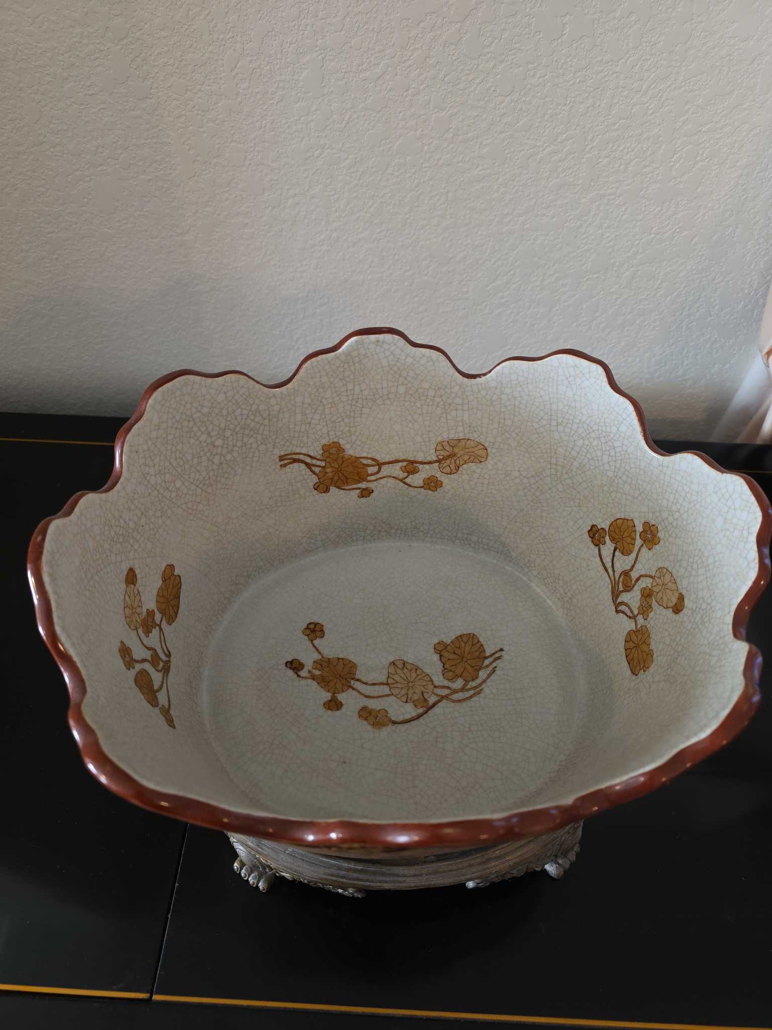 Burgundy floral scalloped porcelain planter with metal base | Maxsold