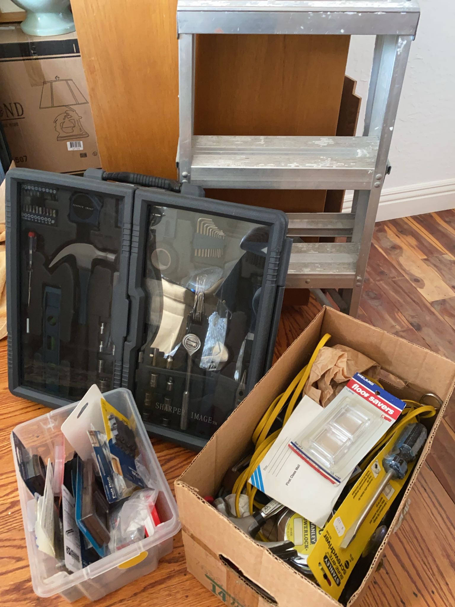 Hand tools, extension cords, felt pads, step ladder | Maxsold