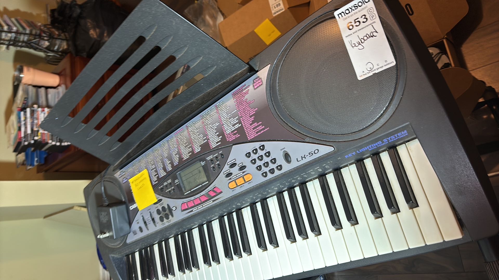 Casio LK-50 electronic keyboard with stand | Maxsold