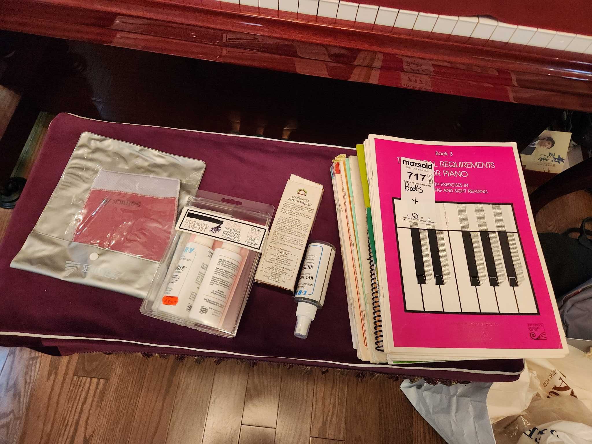Piano sheet music books with care kit | Maxsold