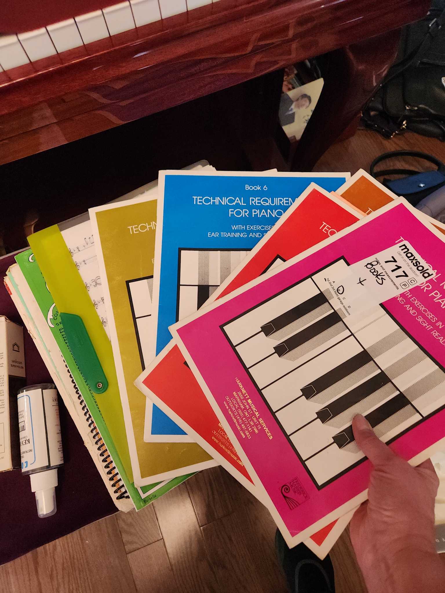 Piano sheet music books with care kit | Maxsold