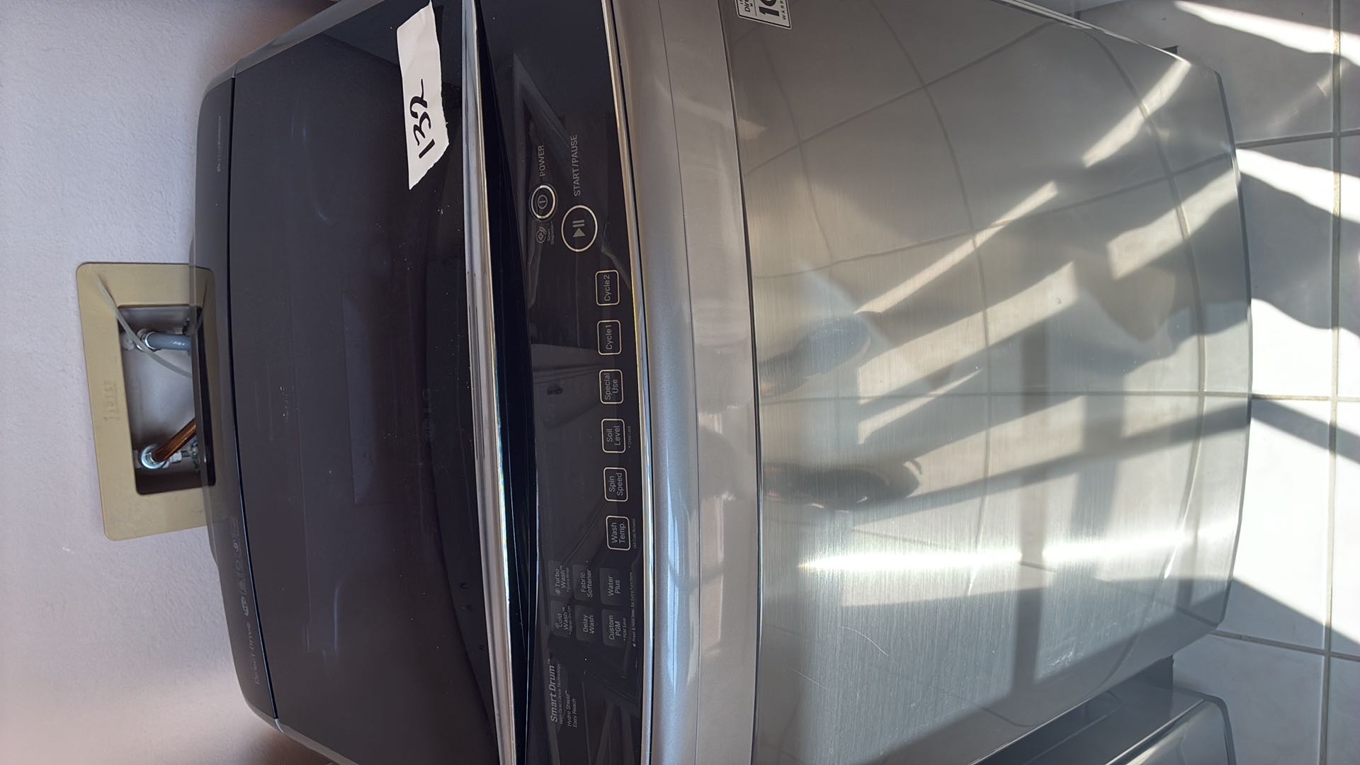 LG Stainless Steel Top-Load Washing Machine | Maxsold